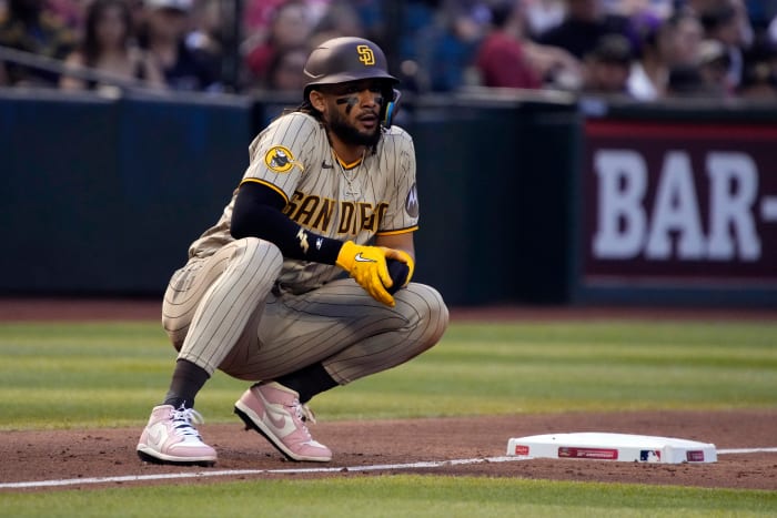 San Diego Padres outfielder Fernando Tatis Jr. leads off third base during a game.